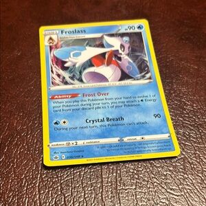 Froslass Pokémon Card - Blue and Yellow